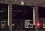 Image of buses in garage United States USA, 1937, second 14 stock footage video 65675051568