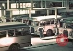 Image of buses in garage United States USA, 1937, second 20 stock footage video 65675051568