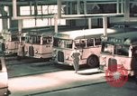 Image of buses in garage United States USA, 1937, second 21 stock footage video 65675051568
