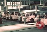 Image of buses in garage United States USA, 1937, second 23 stock footage video 65675051568