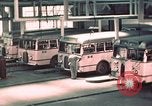 Image of buses in garage United States USA, 1937, second 25 stock footage video 65675051568