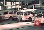 Image of buses in garage United States USA, 1937, second 27 stock footage video 65675051568