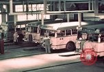 Image of buses in garage United States USA, 1937, second 29 stock footage video 65675051568