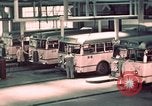 Image of buses in garage United States USA, 1937, second 30 stock footage video 65675051568