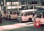 Image of buses in garage United States USA, 1937, second 32 stock footage video 65675051568