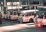 Image of buses in garage United States USA, 1937, second 33 stock footage video 65675051568