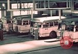 Image of buses in garage United States USA, 1937, second 35 stock footage video 65675051568