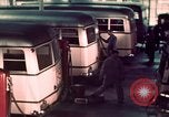 Image of buses in garage United States USA, 1937, second 37 stock footage video 65675051568
