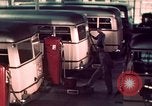 Image of buses in garage United States USA, 1937, second 38 stock footage video 65675051568