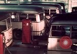 Image of buses in garage United States USA, 1937, second 39 stock footage video 65675051568