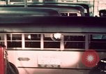 Image of buses in garage United States USA, 1937, second 42 stock footage video 65675051568