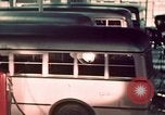 Image of buses in garage United States USA, 1937, second 43 stock footage video 65675051568