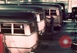 Image of buses in garage United States USA, 1937, second 44 stock footage video 65675051568