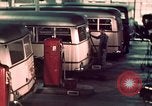 Image of buses in garage United States USA, 1937, second 45 stock footage video 65675051568