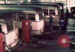 Image of buses in garage United States USA, 1937, second 49 stock footage video 65675051568