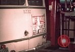 Image of buses in garage United States USA, 1937, second 53 stock footage video 65675051568