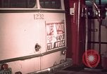 Image of buses in garage United States USA, 1937, second 54 stock footage video 65675051568