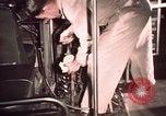 Image of buses in garage United States USA, 1937, second 58 stock footage video 65675051568