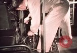 Image of buses in garage United States USA, 1937, second 59 stock footage video 65675051568