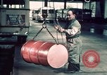 Image of buses in garage United States USA, 1937, second 62 stock footage video 65675051568