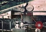 Image of buses in garage United States USA, 1937, second 1 stock footage video 65675051569