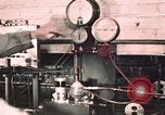 Image of buses in garage United States USA, 1937, second 6 stock footage video 65675051569