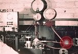 Image of buses in garage United States USA, 1937, second 7 stock footage video 65675051569