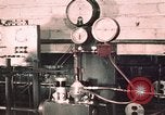 Image of buses in garage United States USA, 1937, second 8 stock footage video 65675051569