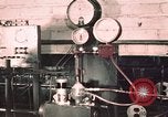 Image of buses in garage United States USA, 1937, second 9 stock footage video 65675051569