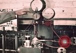 Image of buses in garage United States USA, 1937, second 11 stock footage video 65675051569