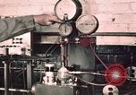Image of buses in garage United States USA, 1937, second 12 stock footage video 65675051569