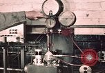 Image of buses in garage United States USA, 1937, second 13 stock footage video 65675051569