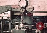 Image of buses in garage United States USA, 1937, second 14 stock footage video 65675051569