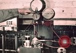 Image of buses in garage United States USA, 1937, second 18 stock footage video 65675051569
