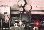 Image of buses in garage United States USA, 1937, second 20 stock footage video 65675051569