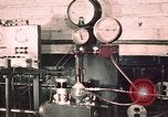Image of buses in garage United States USA, 1937, second 21 stock footage video 65675051569