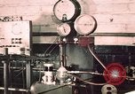 Image of buses in garage United States USA, 1937, second 23 stock footage video 65675051569