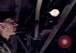 Image of buses in garage United States USA, 1937, second 30 stock footage video 65675051569