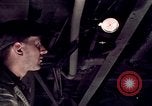 Image of buses in garage United States USA, 1937, second 32 stock footage video 65675051569