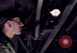 Image of buses in garage United States USA, 1937, second 33 stock footage video 65675051569