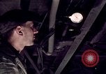 Image of buses in garage United States USA, 1937, second 37 stock footage video 65675051569