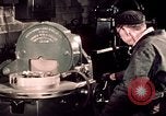 Image of buses in garage United States USA, 1937, second 49 stock footage video 65675051569
