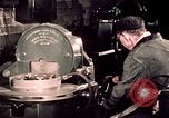 Image of buses in garage United States USA, 1937, second 50 stock footage video 65675051569