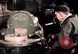Image of buses in garage United States USA, 1937, second 51 stock footage video 65675051569