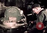 Image of buses in garage United States USA, 1937, second 52 stock footage video 65675051569