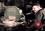 Image of buses in garage United States USA, 1937, second 53 stock footage video 65675051569