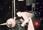 Image of buses in garage United States USA, 1937, second 61 stock footage video 65675051569