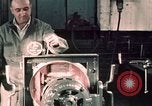 Image of buses in garage United States USA, 1937, second 62 stock footage video 65675051569
