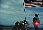 Image of famous American flag raising Mount Suribachi Iwo Jima, 1945, second 22 stock footage video 65675051573