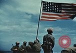 Image of famous American flag raising Mount Suribachi Iwo Jima, 1945, second 24 stock footage video 65675051573